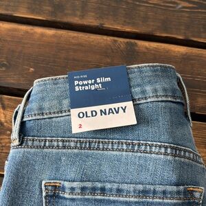 Old Navy Mid-Rise Power Slim Straight Jeans 
Size 2 
NWT